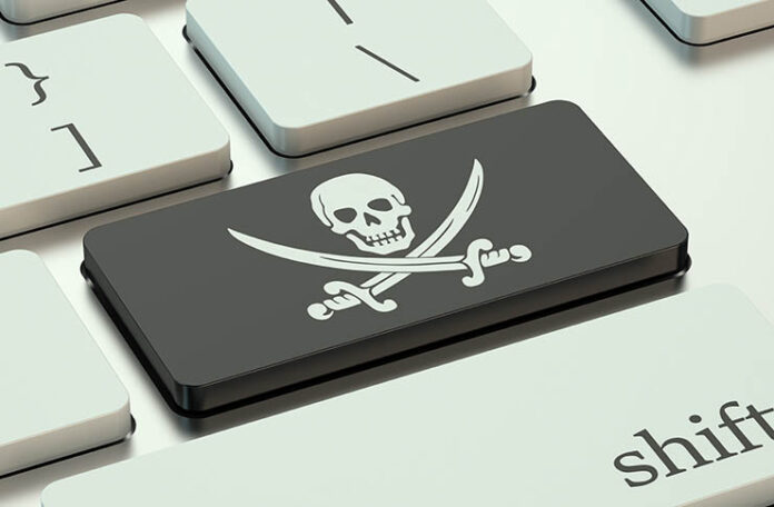 keyboard with pirate key - red flags to avoid pirate websites